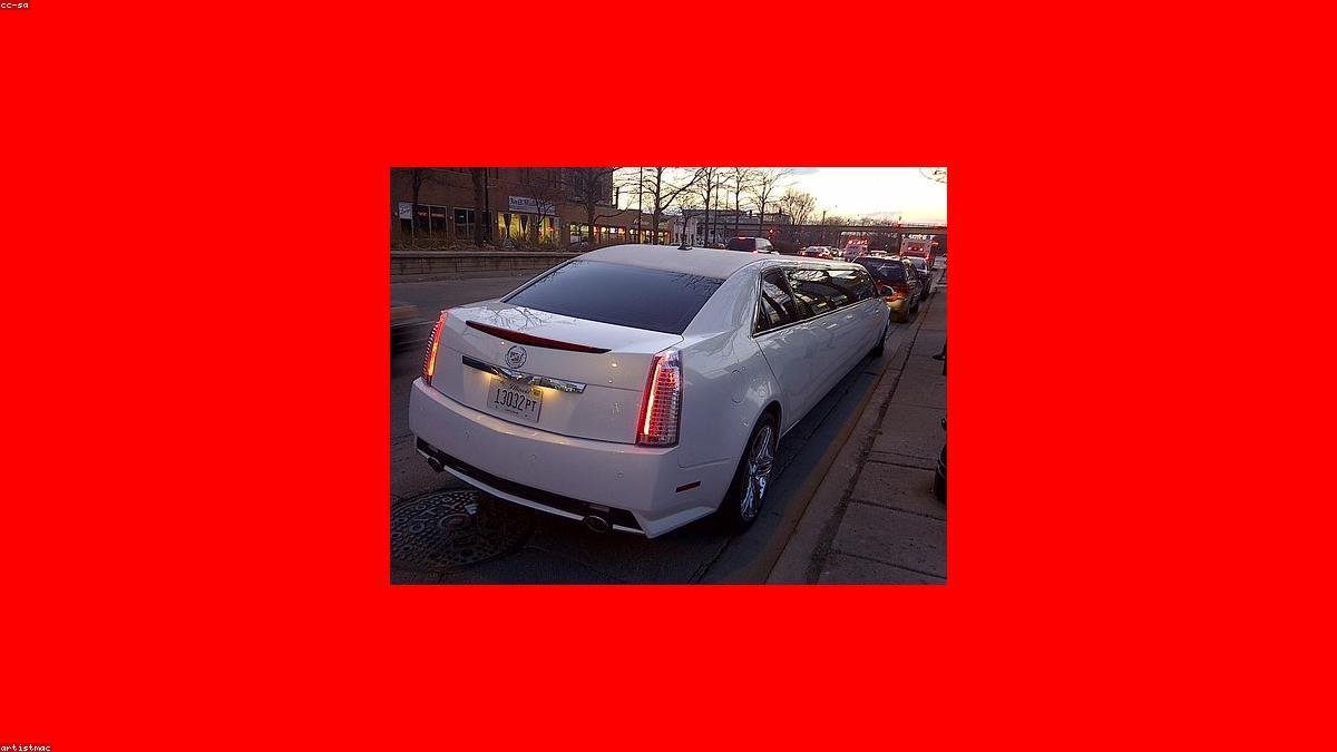 Close detail of a polished wheel and lower body panel - IQ Limousine chauffeur service, Chicago. Chicago Child Car Seat